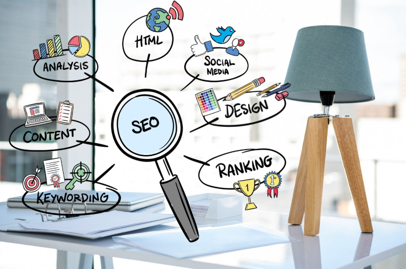 Magnifying glass focused on the word “SEO” surrounded by doodles for content, keywords, ranking, design, and social media.